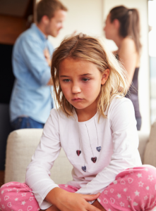 sad girl and parents arguing